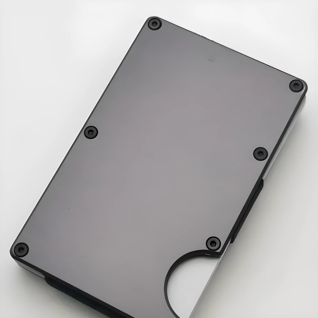 Aluminium grey carbon fibre RFID blocking credit card wallet with seven slots.