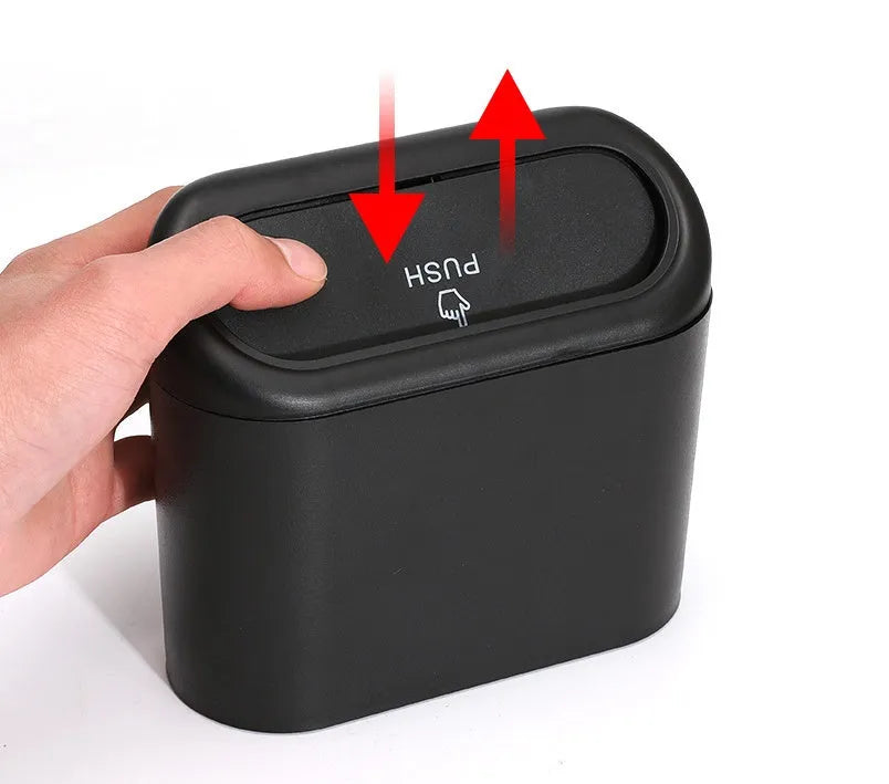 Black ABS car trash can with upturned lid and removable hook, 160x143x85mm, on car seat