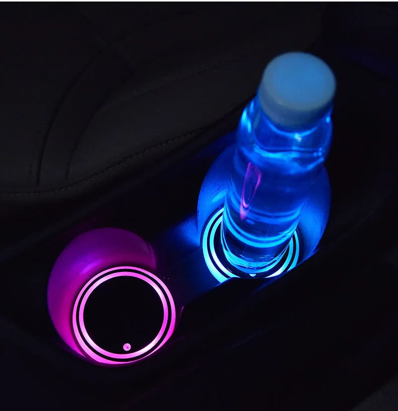 Car cup holder LED light-up coaster showing 7 colour options with USB charging cable