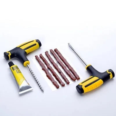 8 piece vacuum tyre repair tool kit with black tools, rubber strips and adhesive bottle