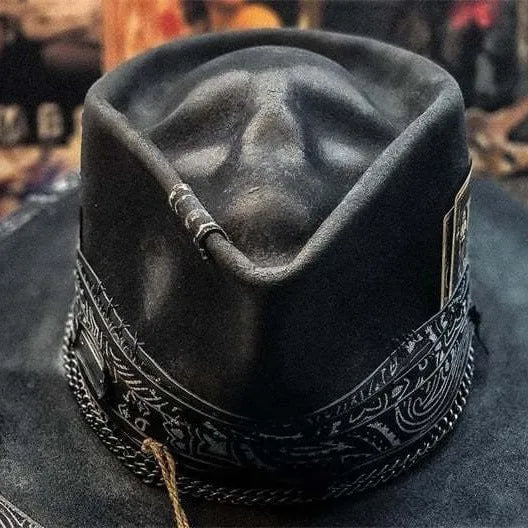 Handmade wool felt skull hat with a pointed conical crown for Halloween.