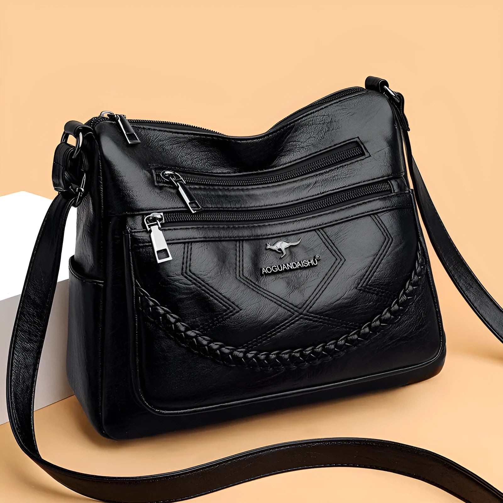 Soft leather women's shoulder bag in horizontal square design with crossbody strap