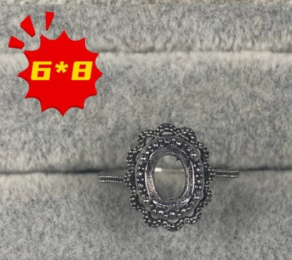 Korean style open mouth copper ring with 6x8mm oval denier stone and star decorations.