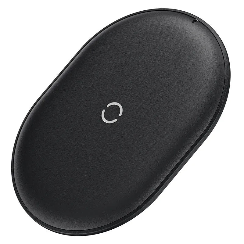 Baseus Rough 15W wireless charging pad in black and white on a table
