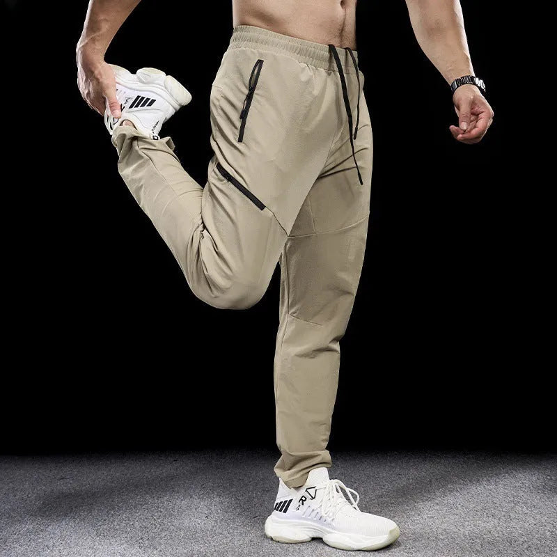 Men's waterproof quick-dry exercise pants in nylon fabric for sports and fitness activities
