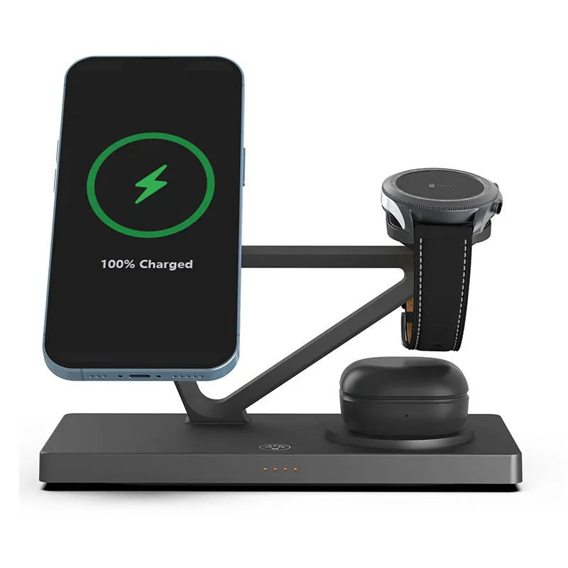White five-in-one wireless charging station with magnetic phone bracket, circular pad, and watch dock, showing a night light glow.