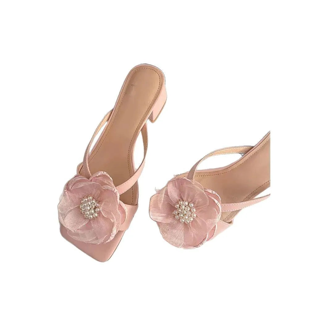Women's cream satin sandals with a chunky block heel, square toe, and single cross-strap.