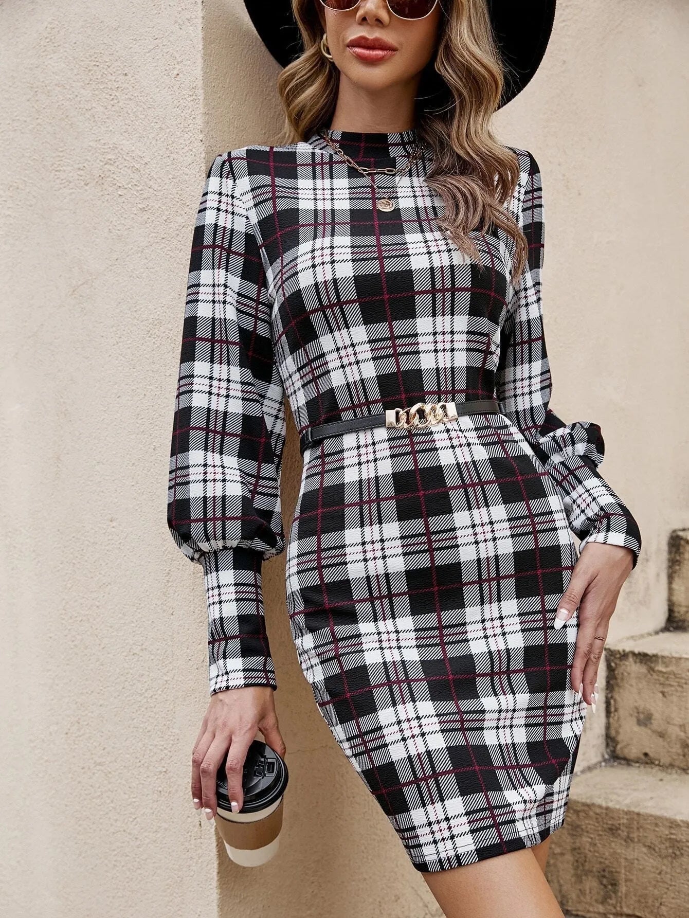 Black women's tight dress with lantern sleeves and leather stitching detail, mid-length polyester casual dress