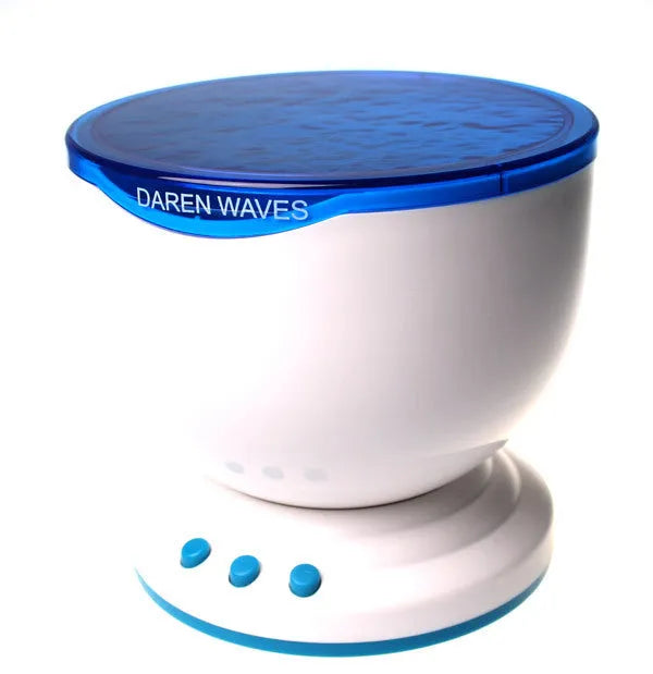 Blue ocean theme LED projection lamp with DLP correction on a surface.