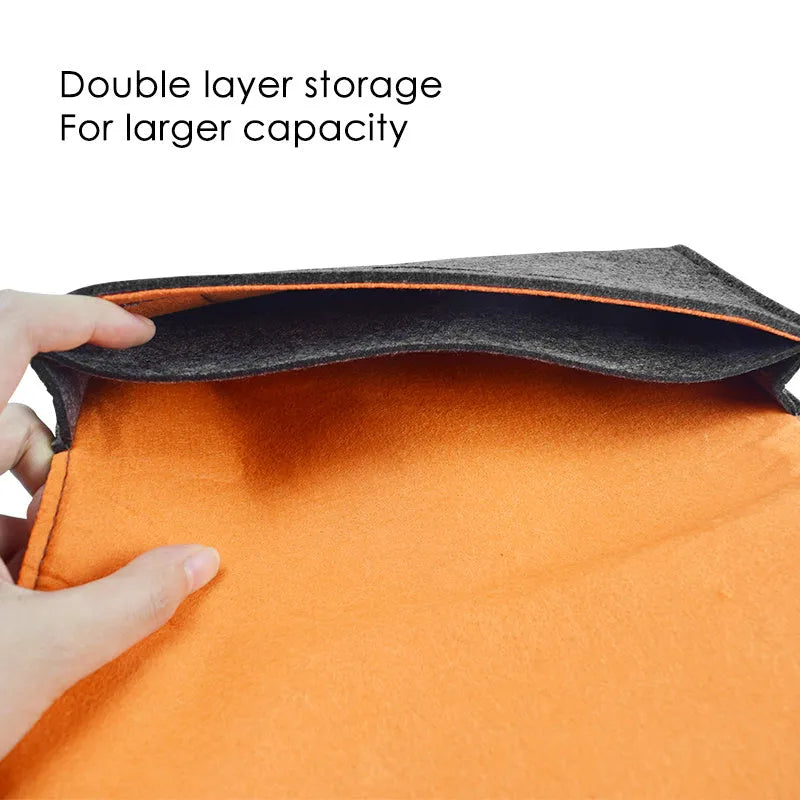 Black felt Nintendo Switch pouch showing game card slots and double storage layers