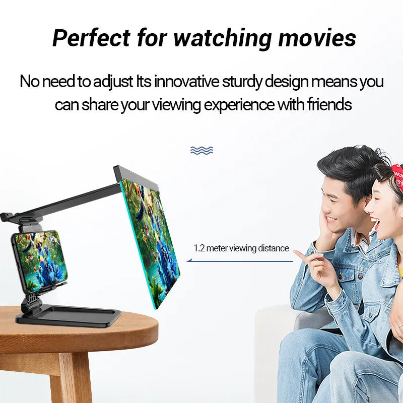 Black folding mobile phone screen amplifier with detachable phone holder on desktop