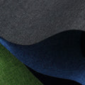 Snowflake and dancing dragon pattern printed on black, blue, and green polyester fabric for luggage and furniture covers.