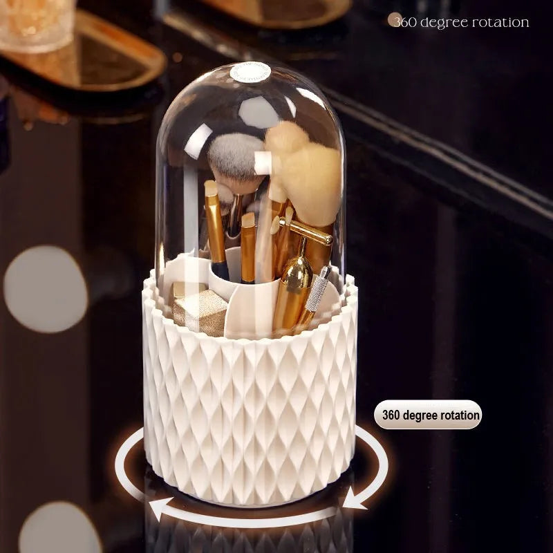 White acrylic rotating makeup brush holder with transparent dust cover on desktop