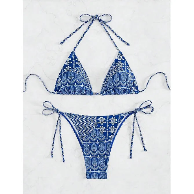 Women's green split bikini swimsuit with bandage-style printed stitching and briefs bottom.