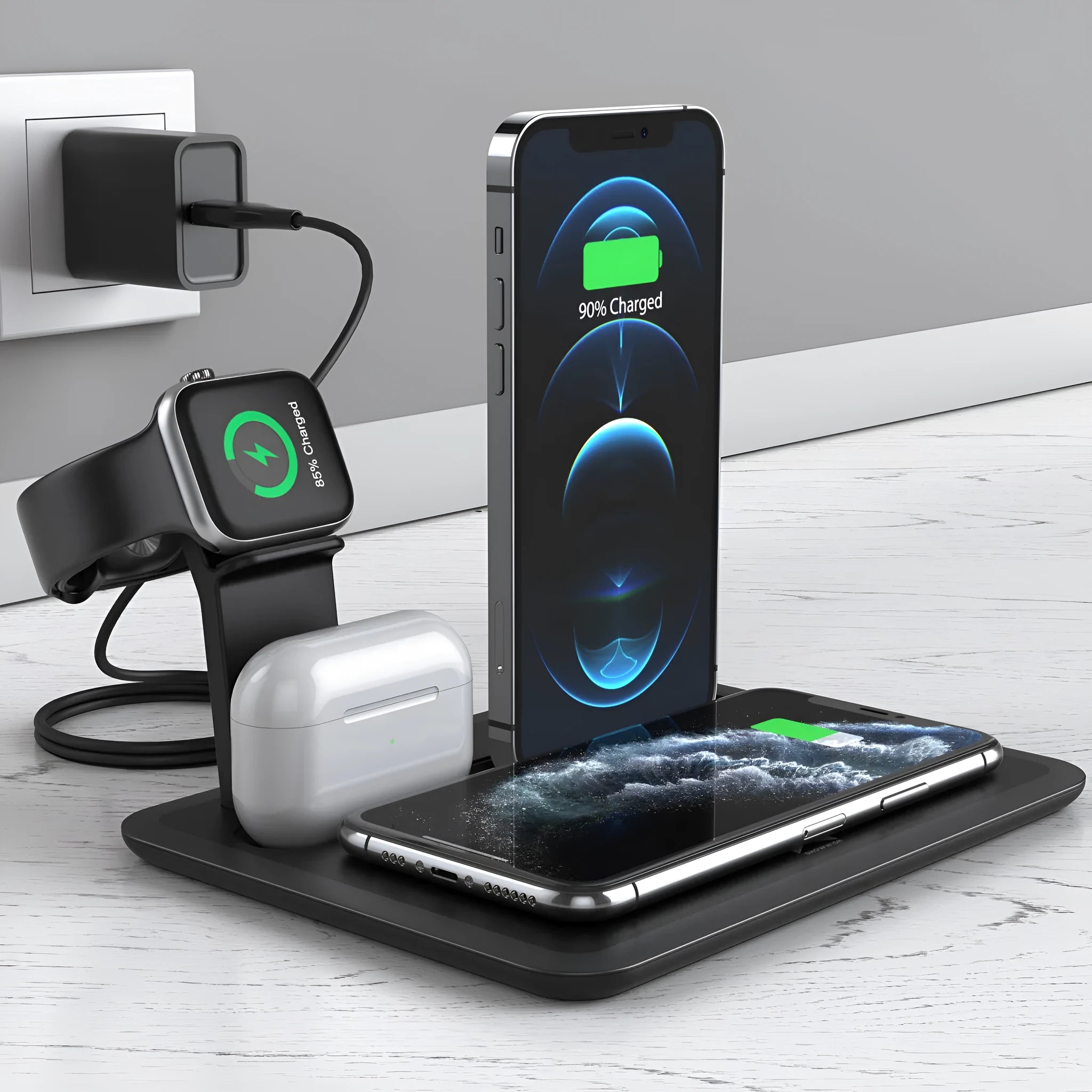 Black wireless charging desk bracket with phone on Qi pad, watch and headphones connected to wired charging ports