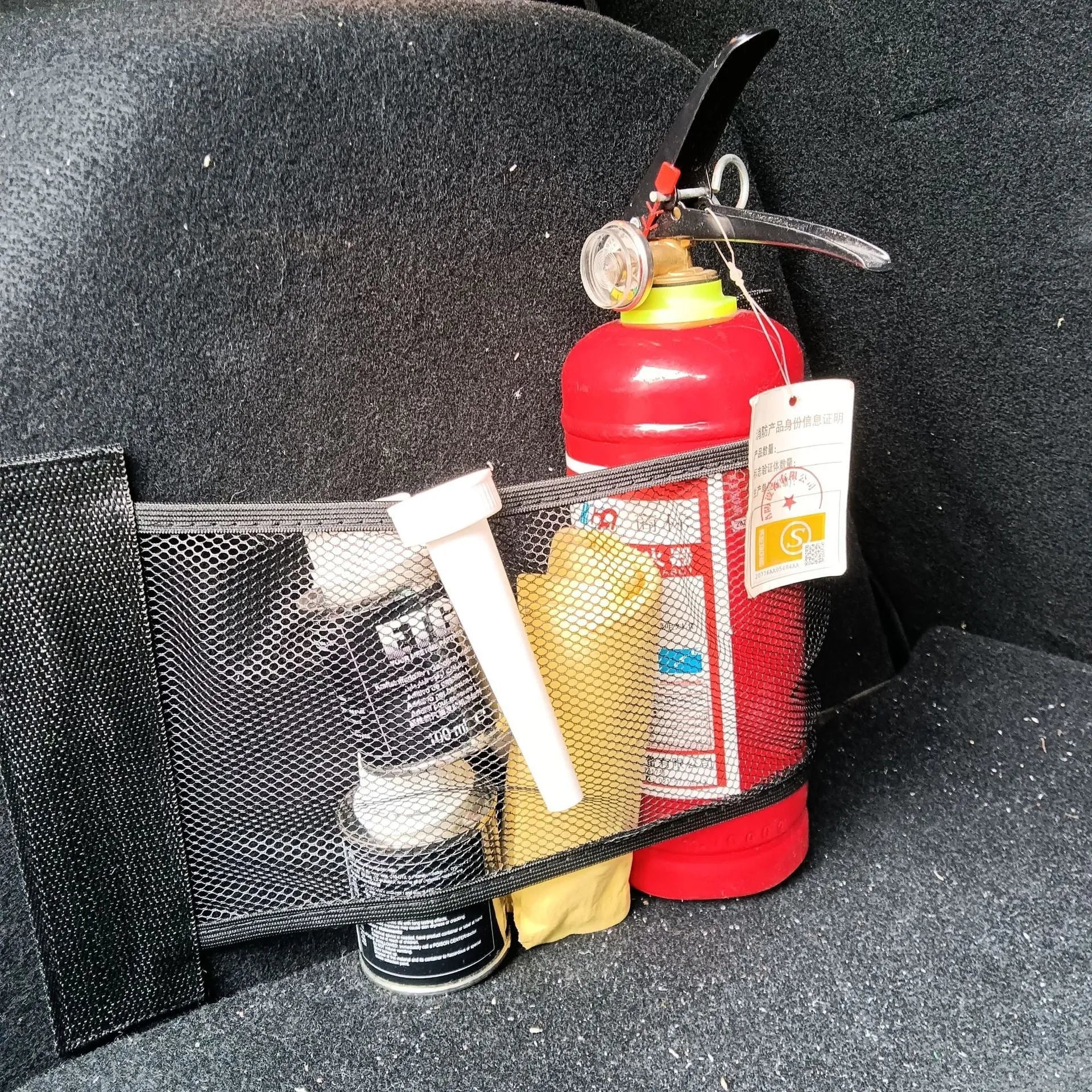 Durable polyester elastic storage net for a car boot, shown in 20x45cm size.