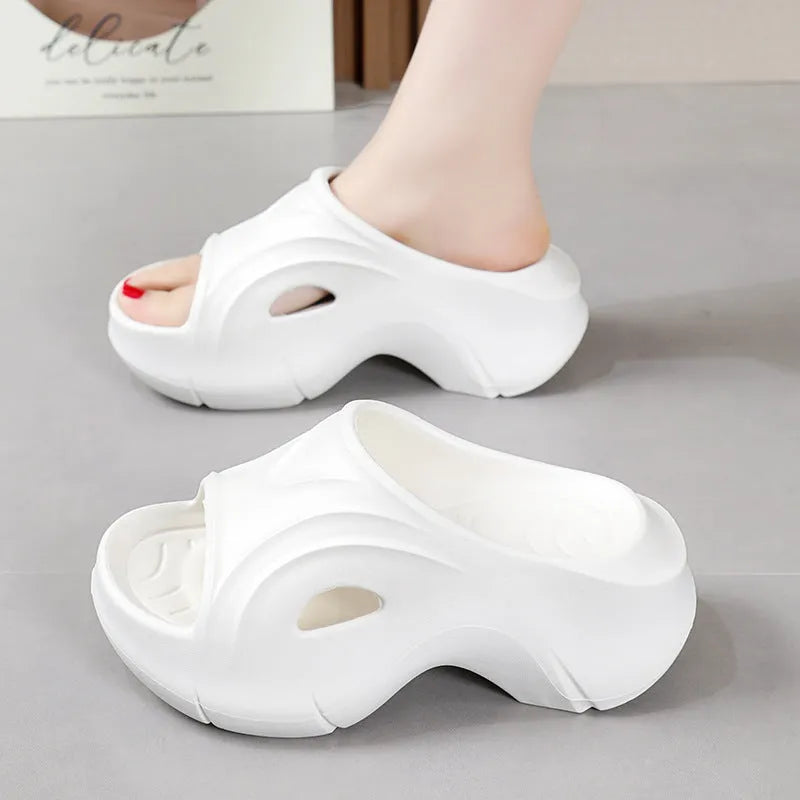 Women's thick-soled EVA beach slippers in black, white and rose red colours