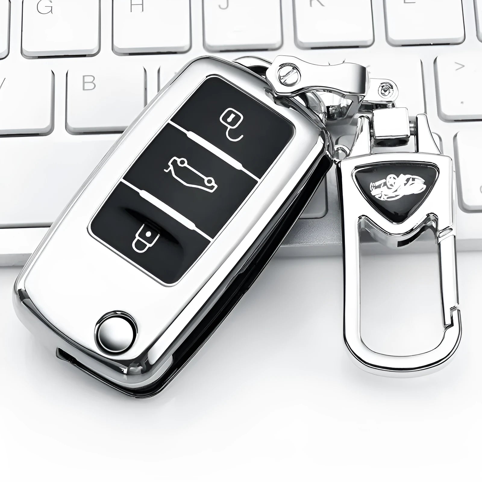 VW Model A folding car key case in TPU material showing colour options: silver, blue, pink, and red.
