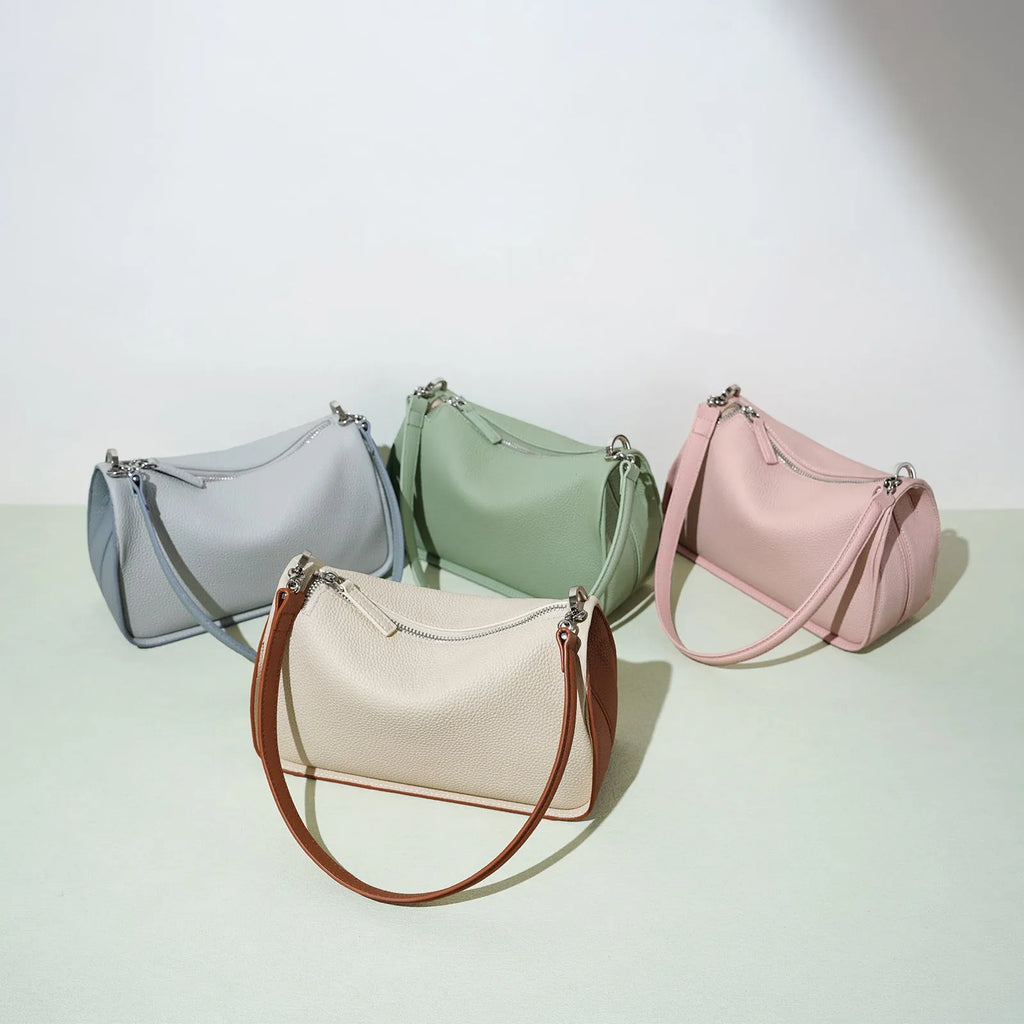 Women's first layer cowhide crossbody bag in pillow shape with double strap 23cm length milkshake white and brown