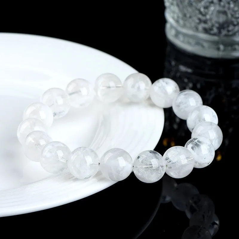 Women's crystal bracelet with matte blizzard-finished round beads and traditional Ruyi Xiangyun design.