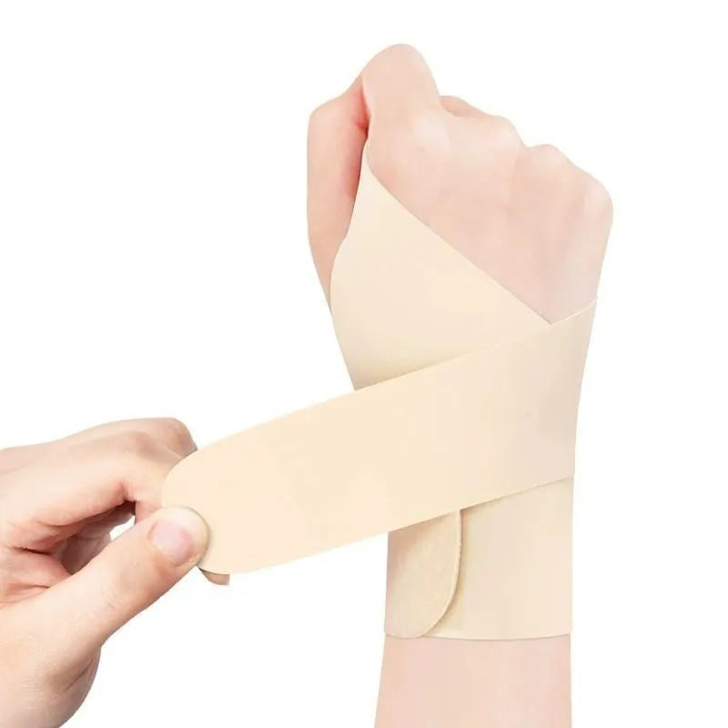 Adjustable athletic wristguard for sports support, shown in black colour with hook-and-loop fastening.