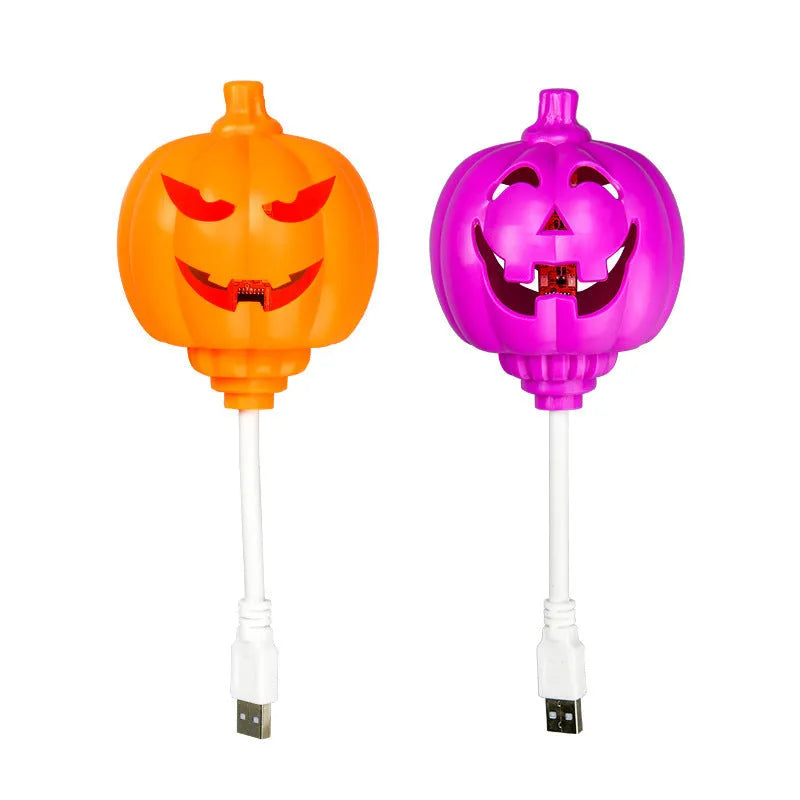 USB-powered plastic pumpkin decorative lamp showing yellow or purple light option