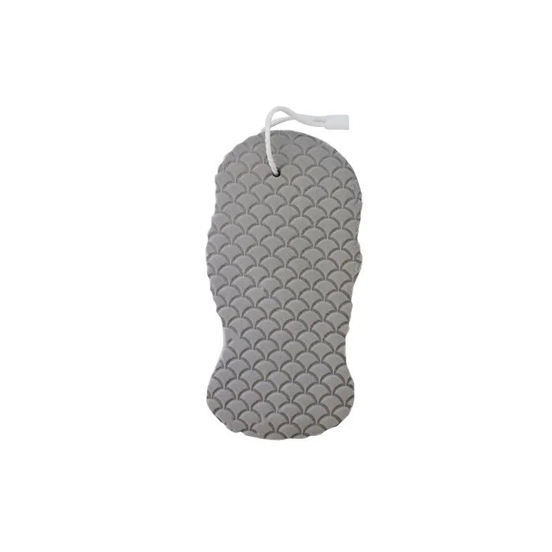 3D fish scale pattern bath sponge ball in assorted colours on a bathroom background.