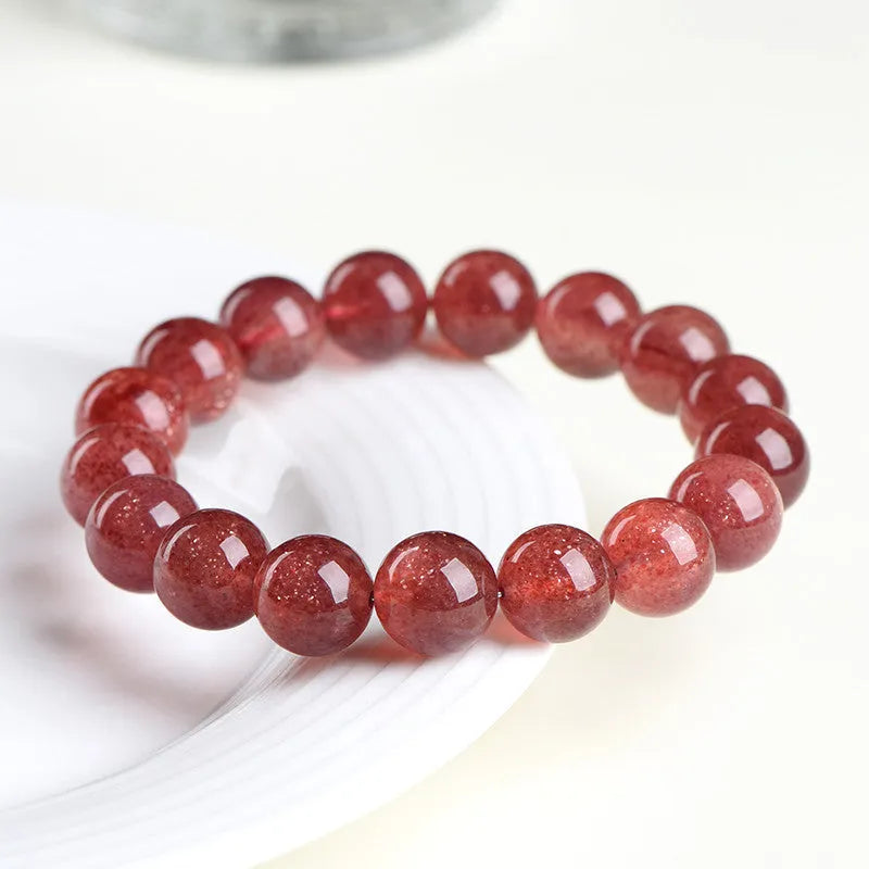 Strawberry quartz geometric bead bracelet with natural starlight cherry red colour