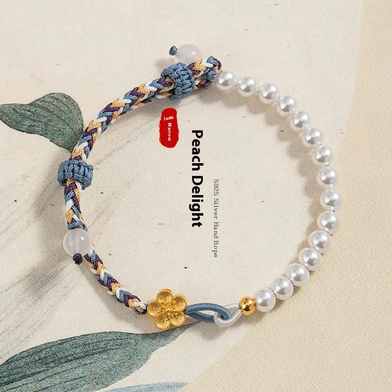 Peach coloured Chinese flower weaving carrying strap with sterling silver chalcedony and pearls on cord bracelet