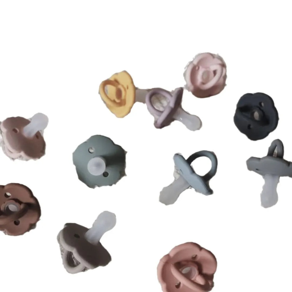Baby pacifier in edible silicone with lace nipple in apricot colour for 0-6 months