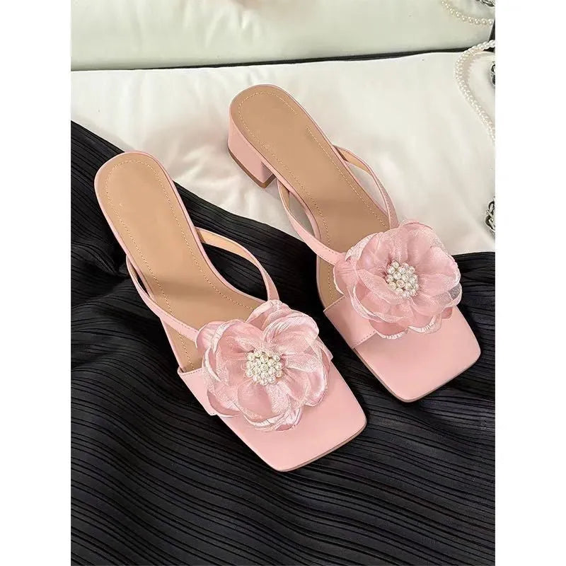 Women's cream satin sandals with a chunky block heel, square toe, and single cross-strap.
