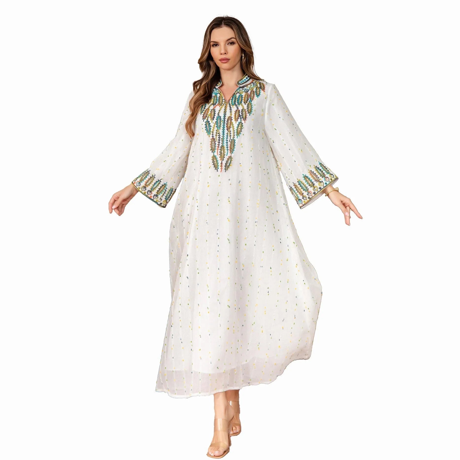 White long sleeve Arabic robe for women, Dubai style, with full-length skirt.