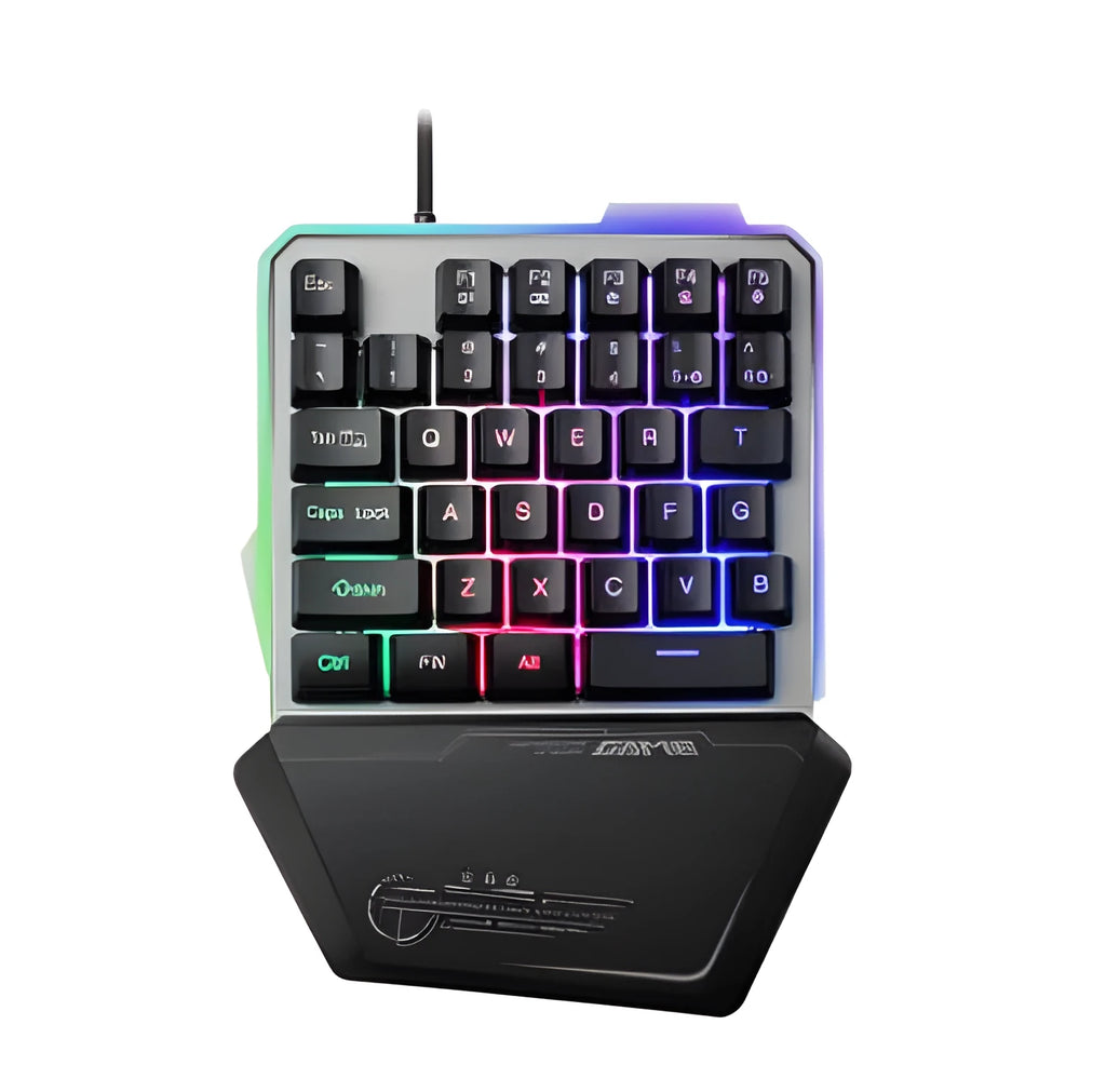 Black G40 Flow Colour one-handed mechanical keyboard with RGB backlit keys on a desk.