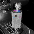 Compact car-mounted air purification humidifier in diamond colours with USB power cable