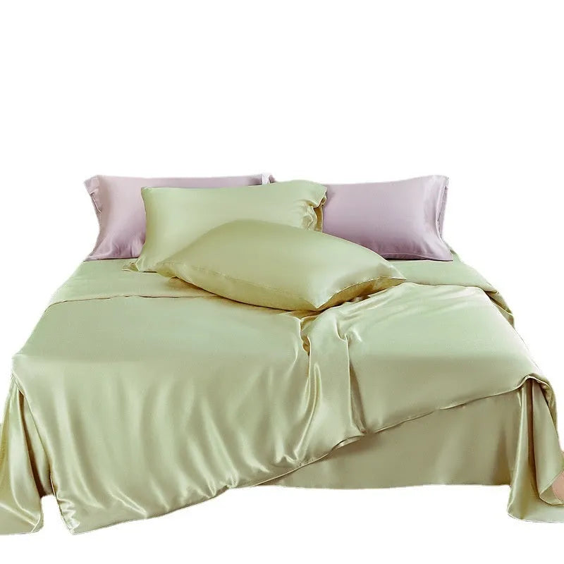 Solid colour double-sided silk duvet cover shown in bright brown, with other colour swatches for Lotus Pink, pea green, mysterious purple, white, and silver blue.
