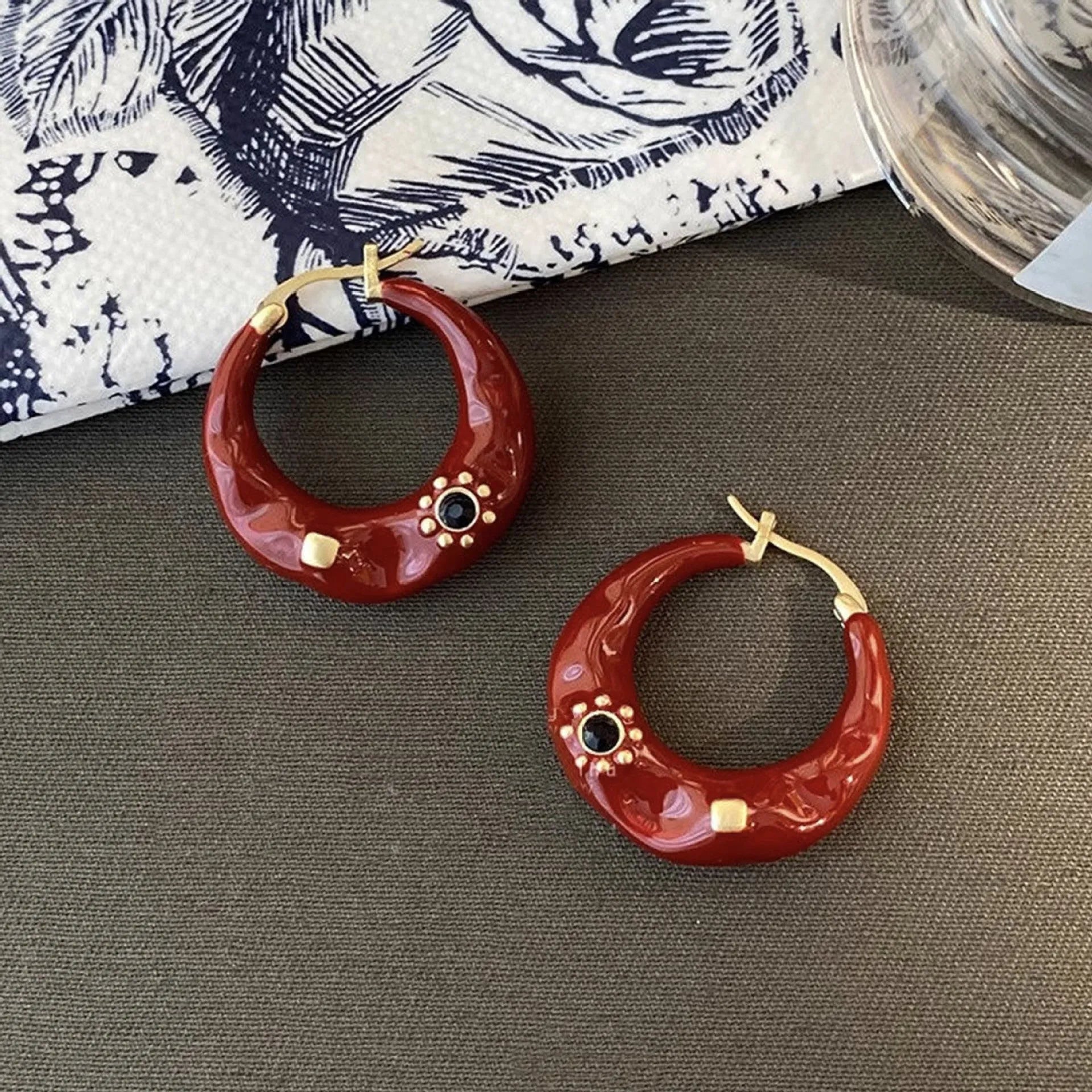 Hong Kong style retro ear studs with rhinestone detailing in black and red colour options