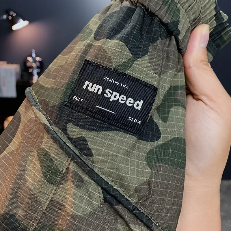 Men's camouflage cargo shorts with quick-dry cotton blend fabric and loose fit design