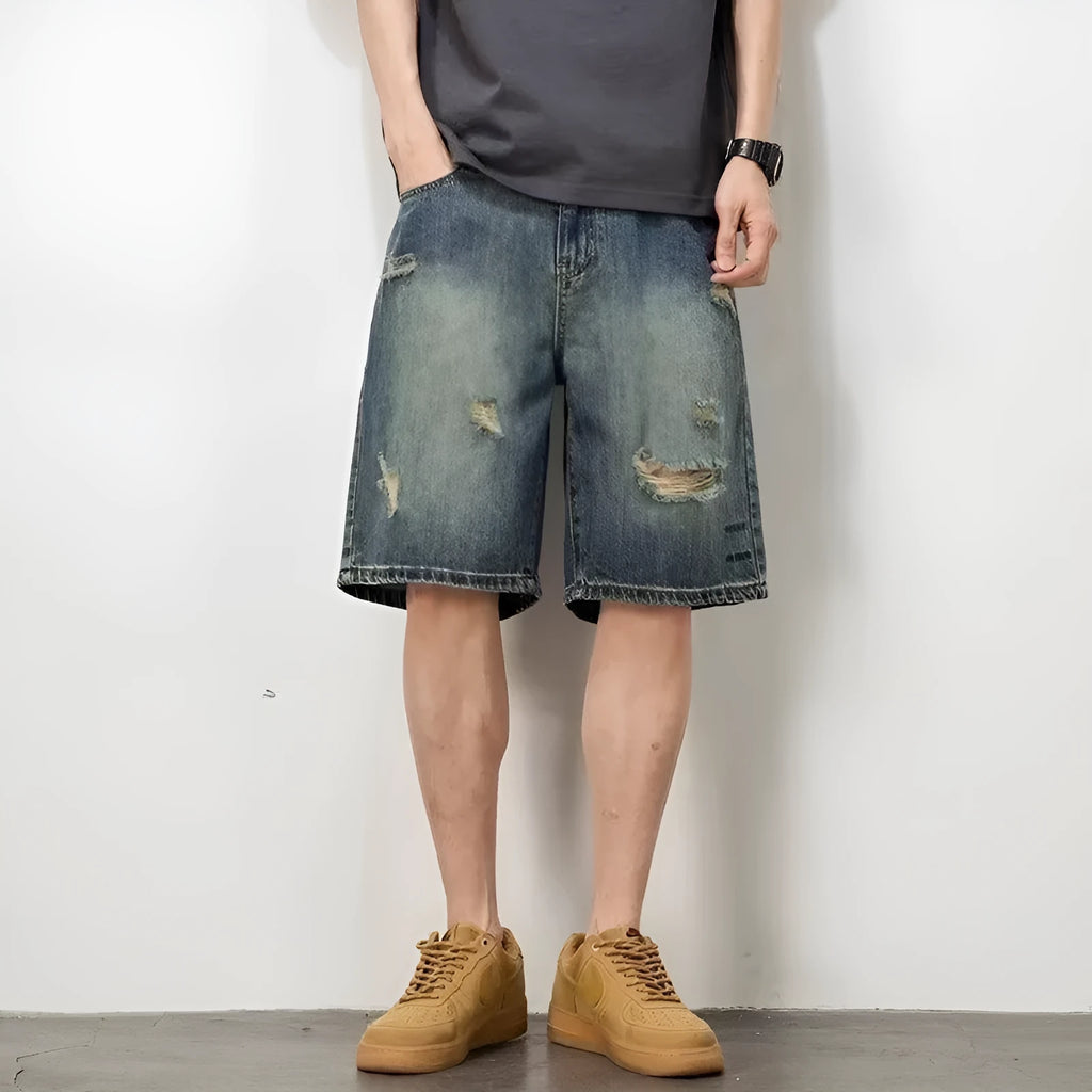 Men's blue denim shorts with retro loose hole design and straight cut