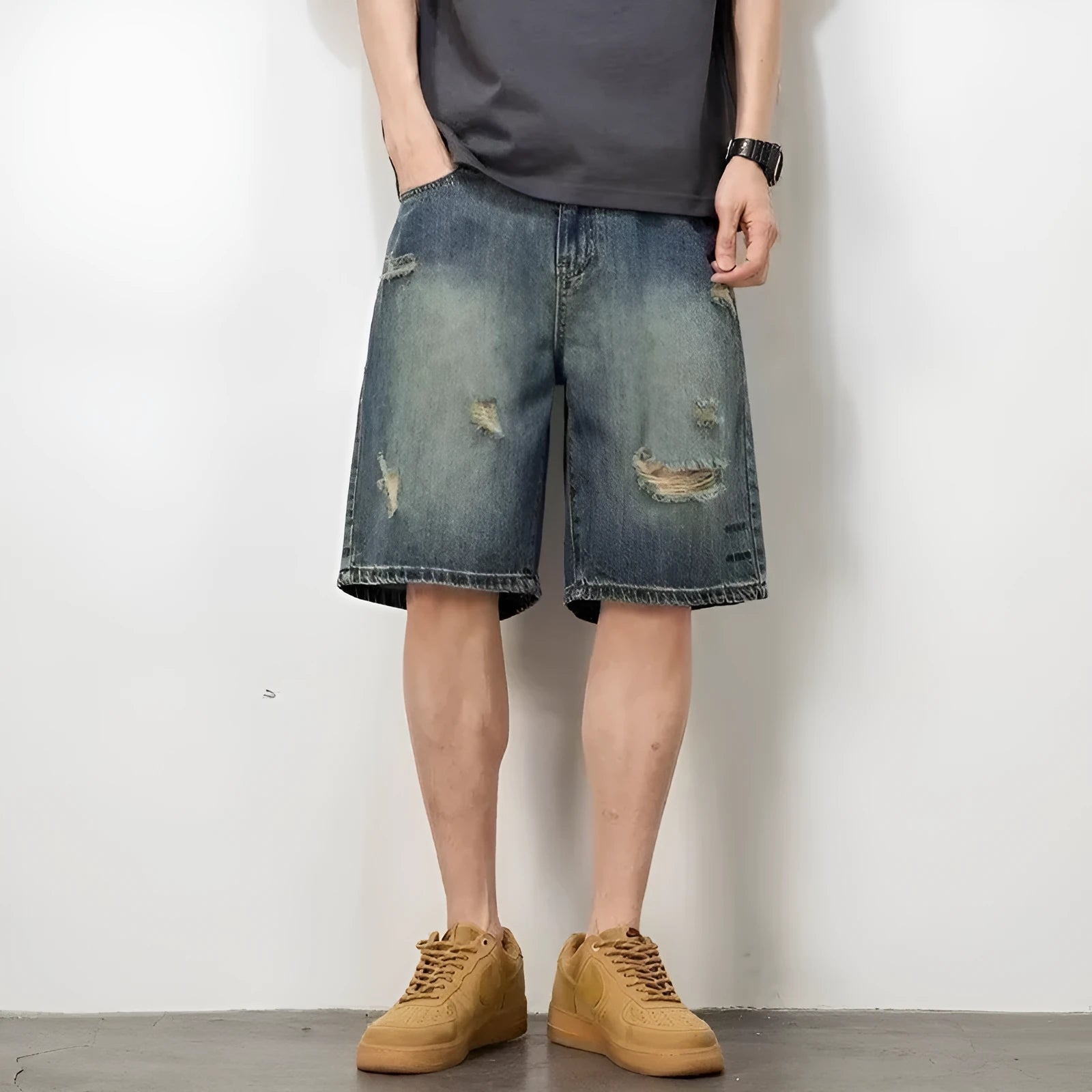 Men's blue denim shorts with retro loose hole design and straight cut