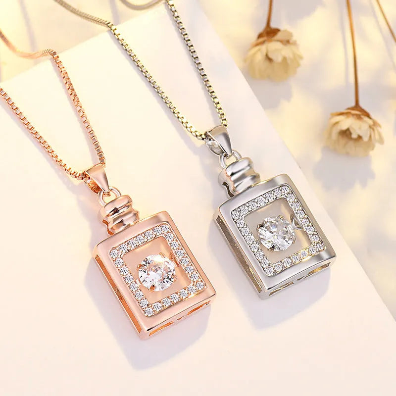Silver or rose gold heart-shaped pendant necklace for women featuring detailed crown and bow decorations.