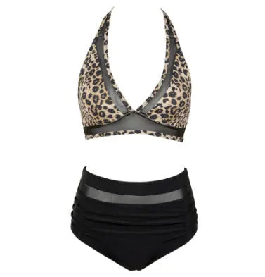 Women's black polyester fibre bikini swimsuit with brief-style bottom on a mannequin.