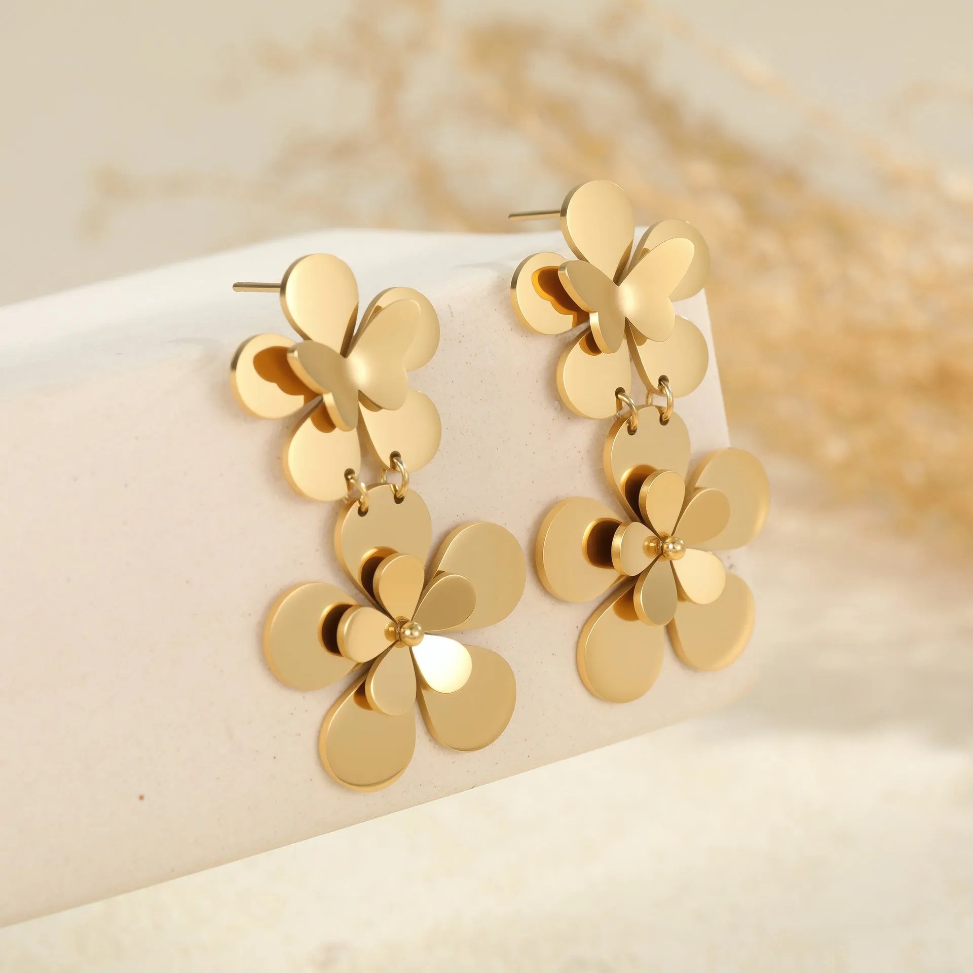 Gold flower butterfly stainless steel earrings with geometric zodiac designs for women