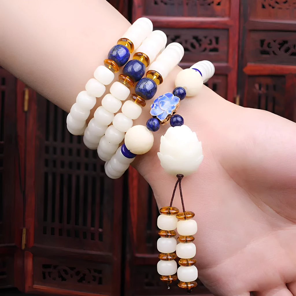 White jade Bodhi beads bracelet showing 6x8mm beads in one of nine available decorative styles