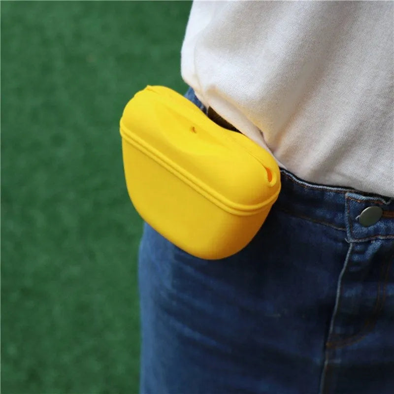Silicone dog training treat waist bag with clip and magnetic closure in assorted colours.