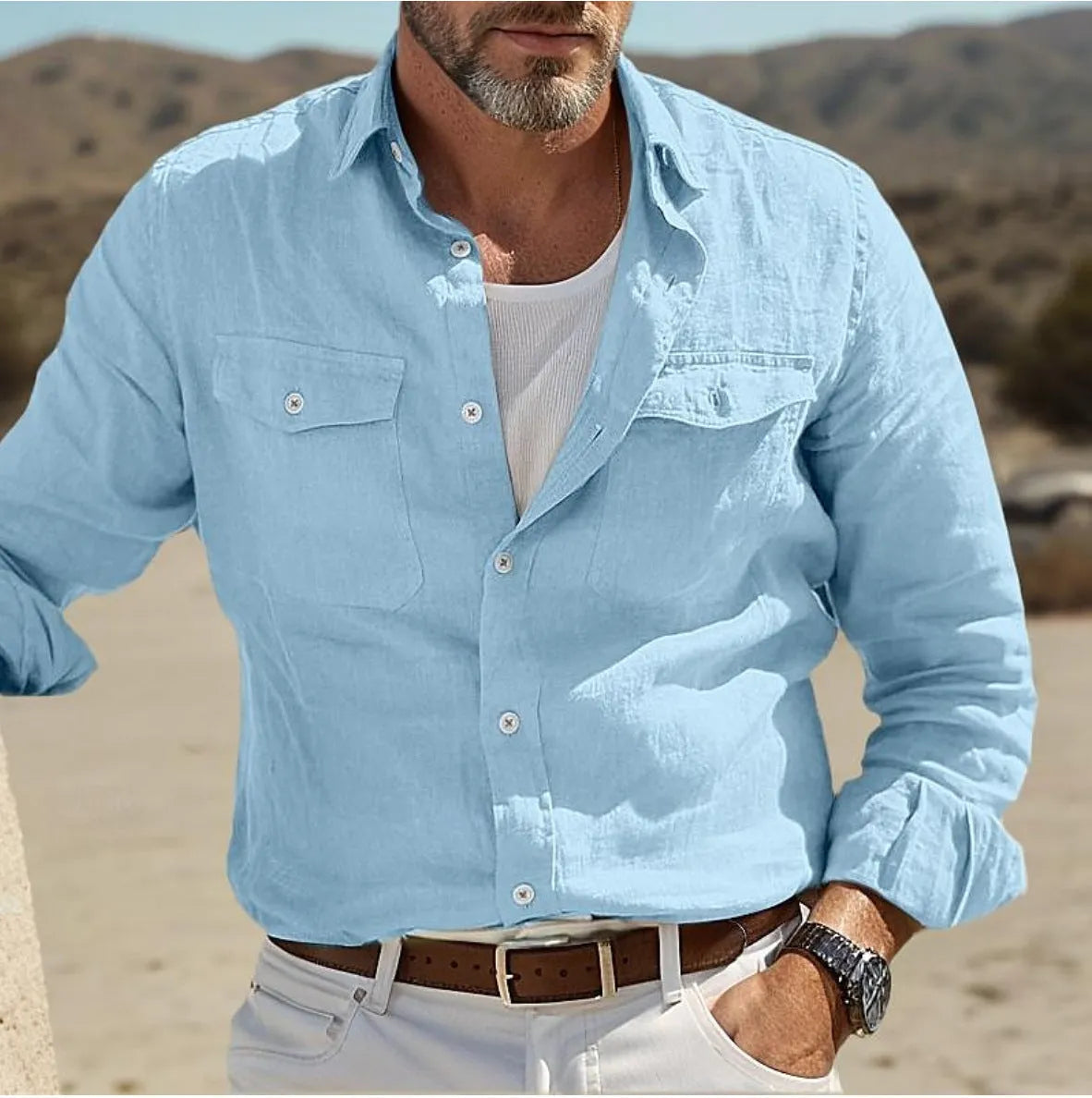 Men's long-sleeved solid colour shirt in a cotton and linen blend, shown in a loose fit.