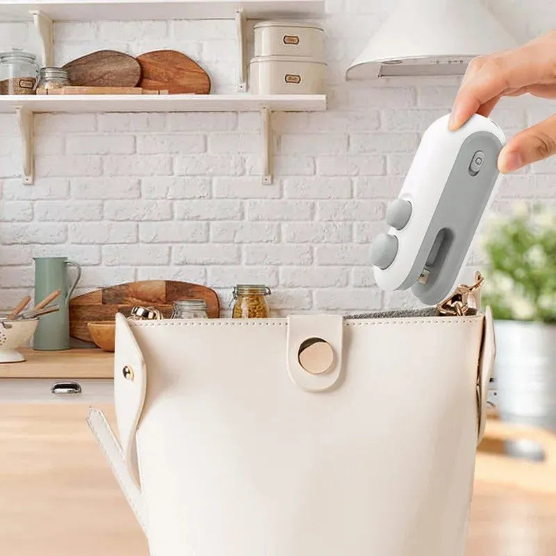 Handheld white heat sealer with magnetic back and Type-C USB charging port
