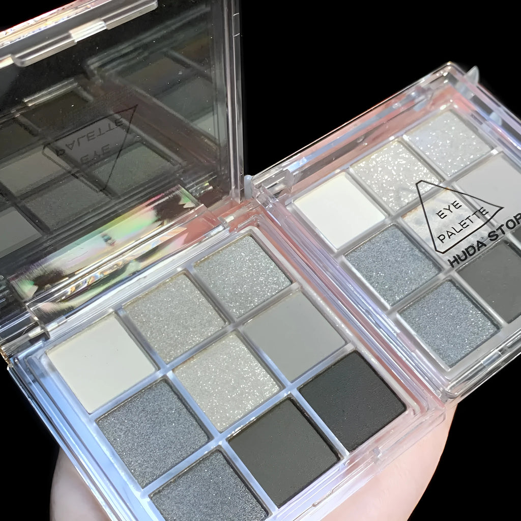 Smoked nine-colour eye shadow palette showing white, silver, black and grey shades