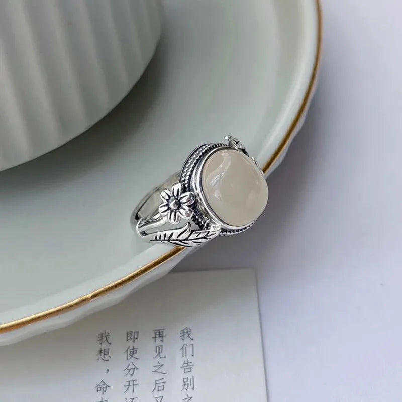 Adjustable copper vintage ring with white chalcedony stone and U-shaped antique design