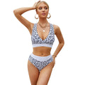 Women's leopard print bikini swimsuit with cross band design and V-neck front