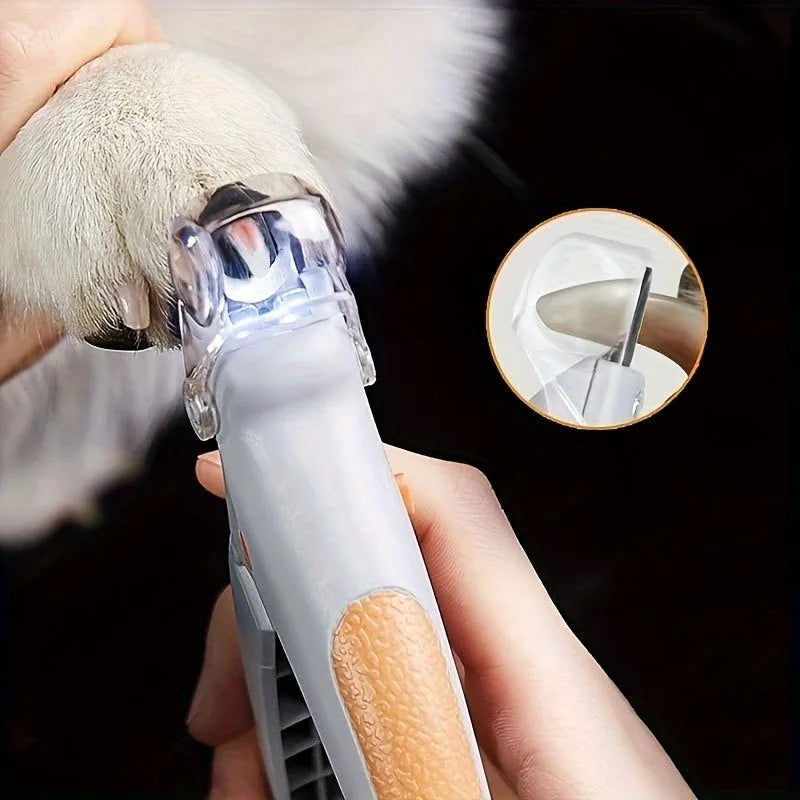 Yellow pet nail trimmer with LED lights, magnifying glass, and comfortable grip for cutting cat and dog claws.